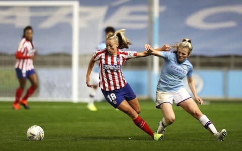 Manchester City's away tie to Atletico Madrid in the Champions League is at risk of not going ahead - Atletico Madrid Women's Toni Duggan and Manchester City Women's Lauren Hemp (right) battle for the ball during the UEFA Women's Champions League match at The Academy Stadium, Manchester. - Credit: PA