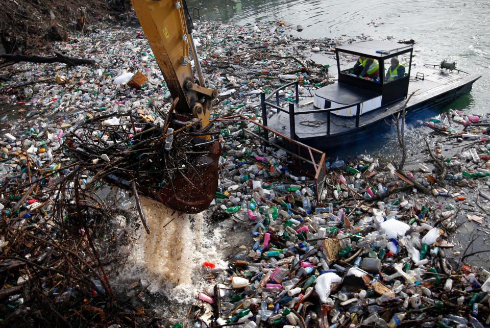 Efforts to clear the waste have begun  - Darko Vojinovic /AP