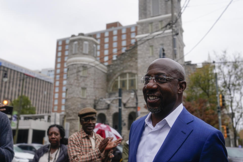 Democratic nominee for U.S. Senate Sen. Raphael Warnock arrives to speak during a news conference, Thursday, Nov. 10, 2022, in Atlanta. Warnock is running against Republican Herschel Walker in a runoff election. (AP Photo/Brynn Anderson)