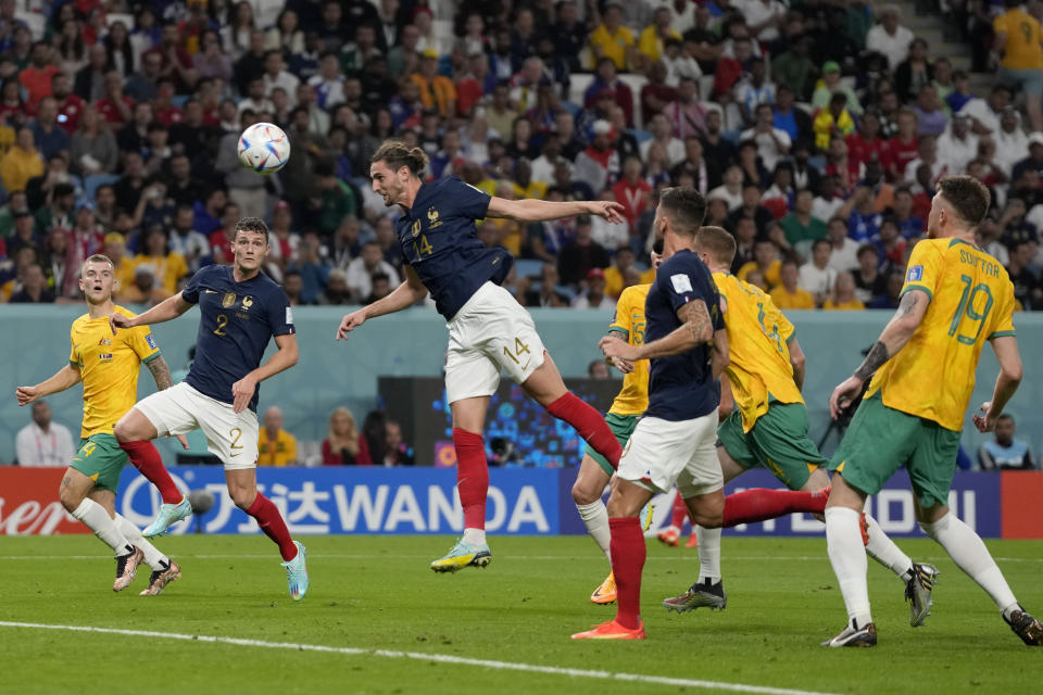 France's Adrien Rabiot scores with a header during the World Cup group D soccer match between France and Australia, at the Al Janoub Stadium in Al Wakrah, Qatar, Friday, Nov. 4, 2022. (AP Photo/Frank Augstein)