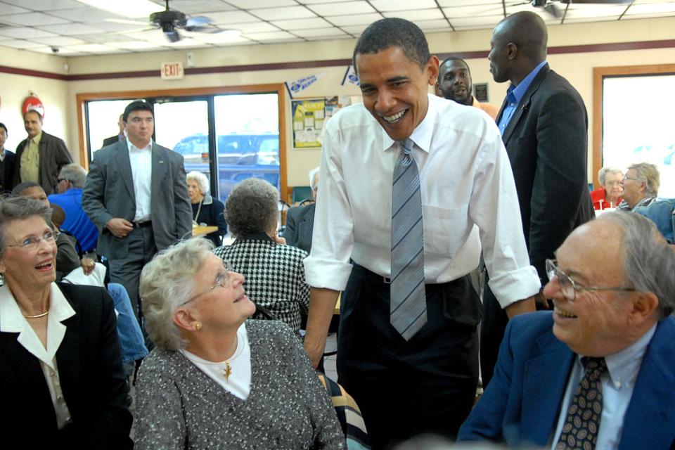 Then-Sen. Barack Obama speaks with Lee Peters, left, and her husband Bill inside of Cape Fear Bar-B-Que & Chicken on Grove Street ON Sunday afternoon, Oct. 19, 2008 on one of his campaign stops in Fayetteville. The Grove Street restaurant announced its closure in a Facebook post last week.
