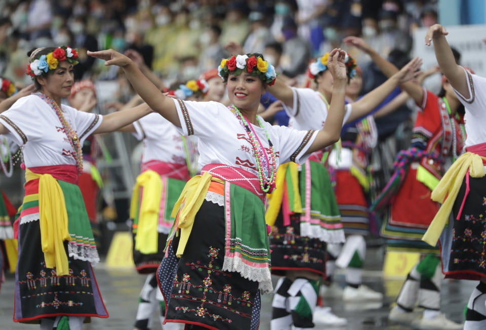 Dancers perform during National Day celebrations in front of the Presidential Building in Taipei, Taiwan, Monday, Oct. 10, 2022. (AP Photo/Chiang Ying-ying)