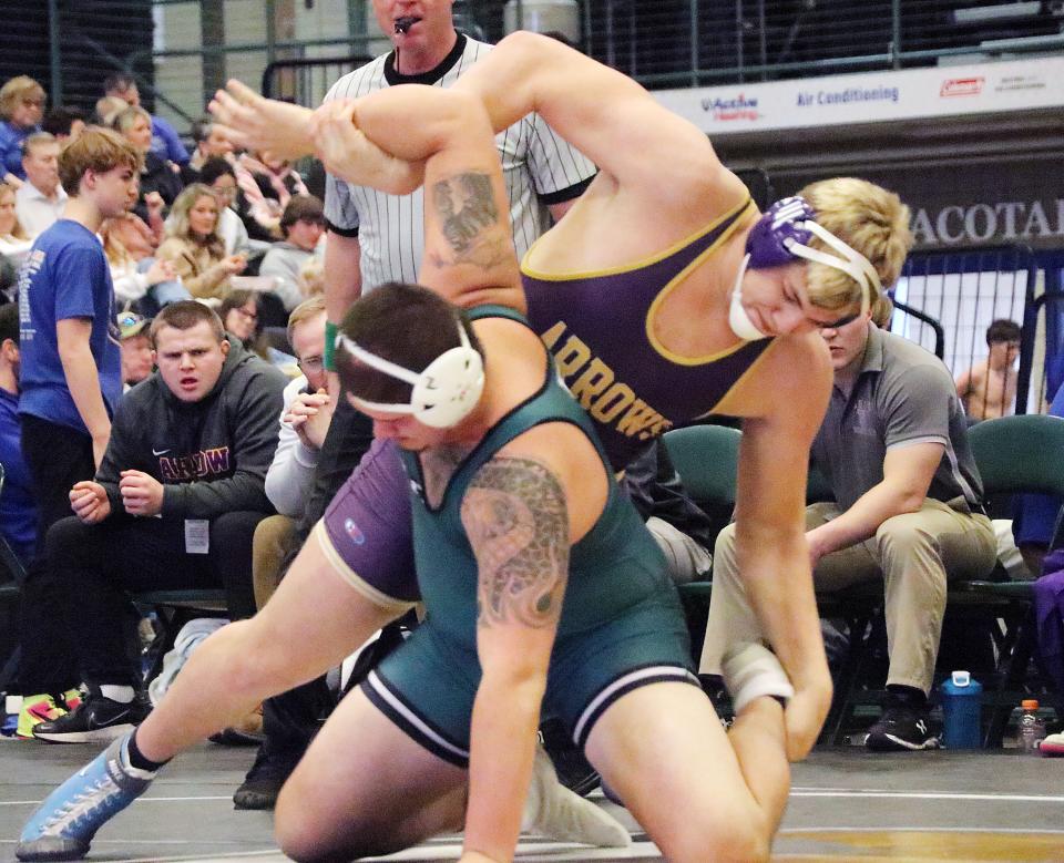 Watertown's Micah Hach controls Pierre's Lucas Colman at 285 pounds during their double semifinal at the South Dakota State Dual Team Wrestling Championships on Saturday, Feb. 10, 2024, in Brookings.