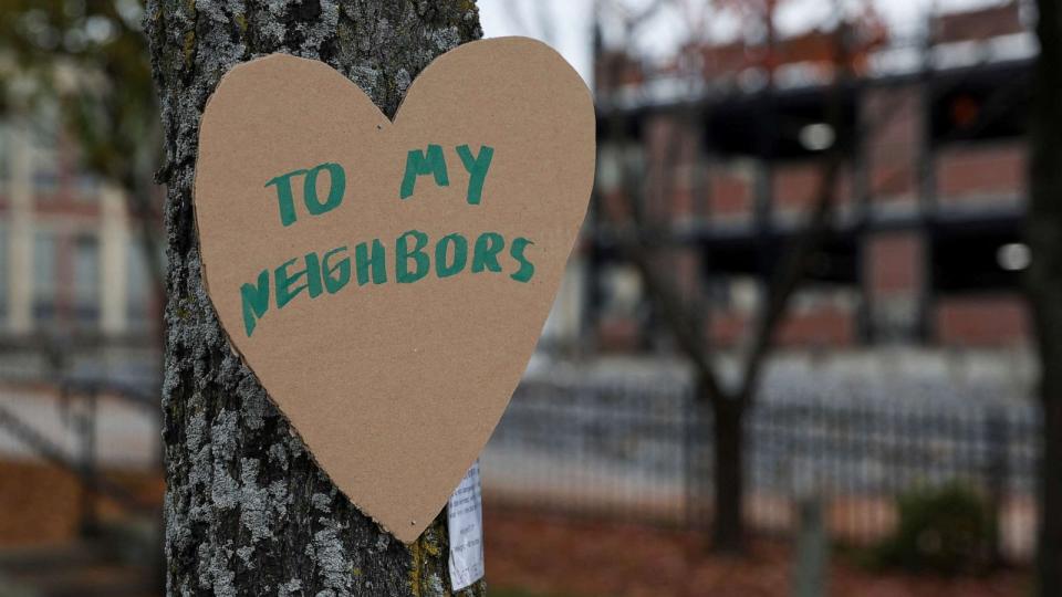 PHOTO: A heart shape sign is seen attached to a tree, following a deadly mass shooting in Lewiston, Maine, Oct. 26, 2023. (Shannon Stapleton/Reuters)