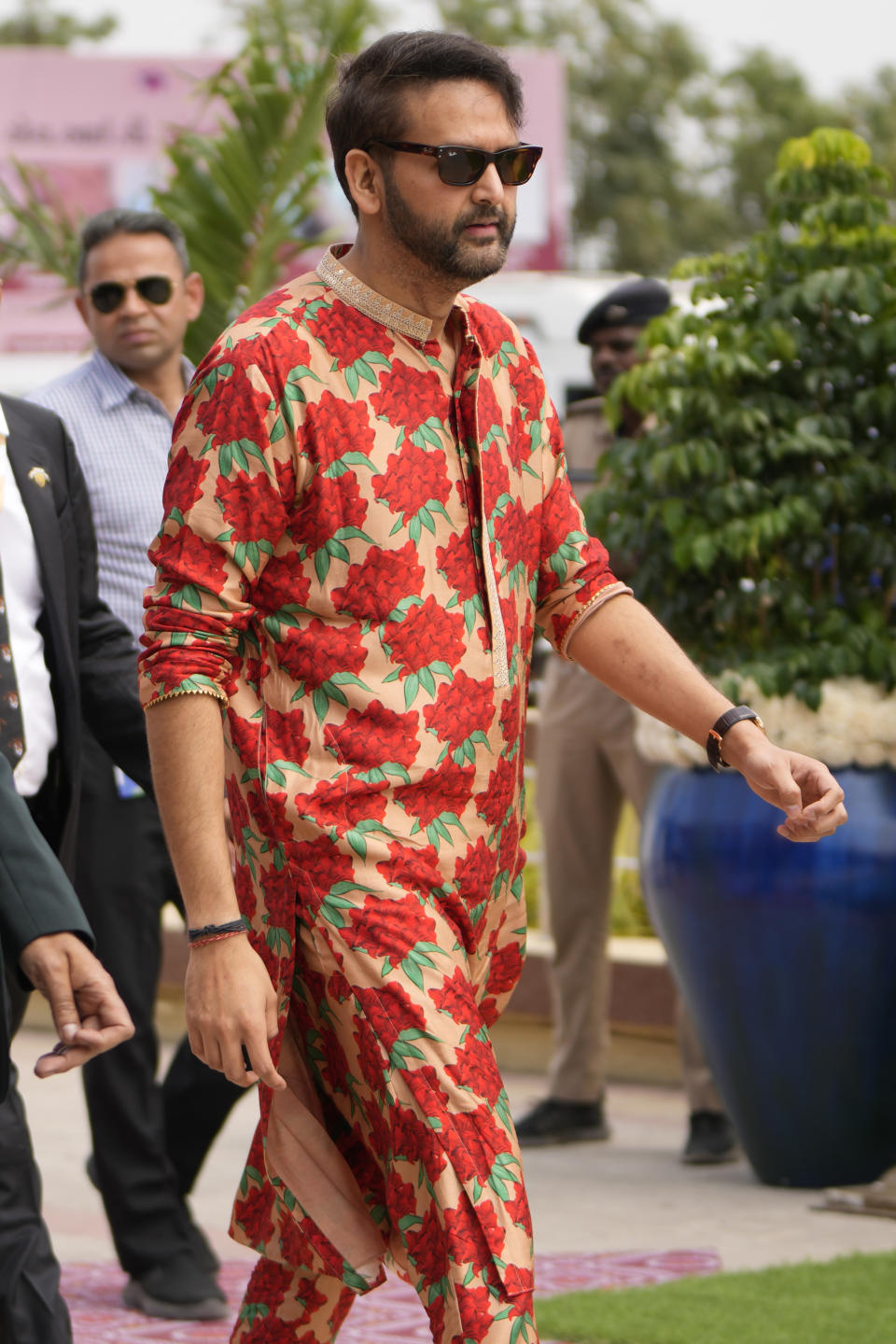 Anand Piramal, Executive director of the Piramal Group, arrives at the airport to oversee arrangements for guests arriving to attend a pre-wedding bash of his billionaire father-in-law Mukesh Ambani's son Anant Ambani, in Jamnagar, India, Friday, March 1, 2024. (AP Photo/Ajit Solanki)