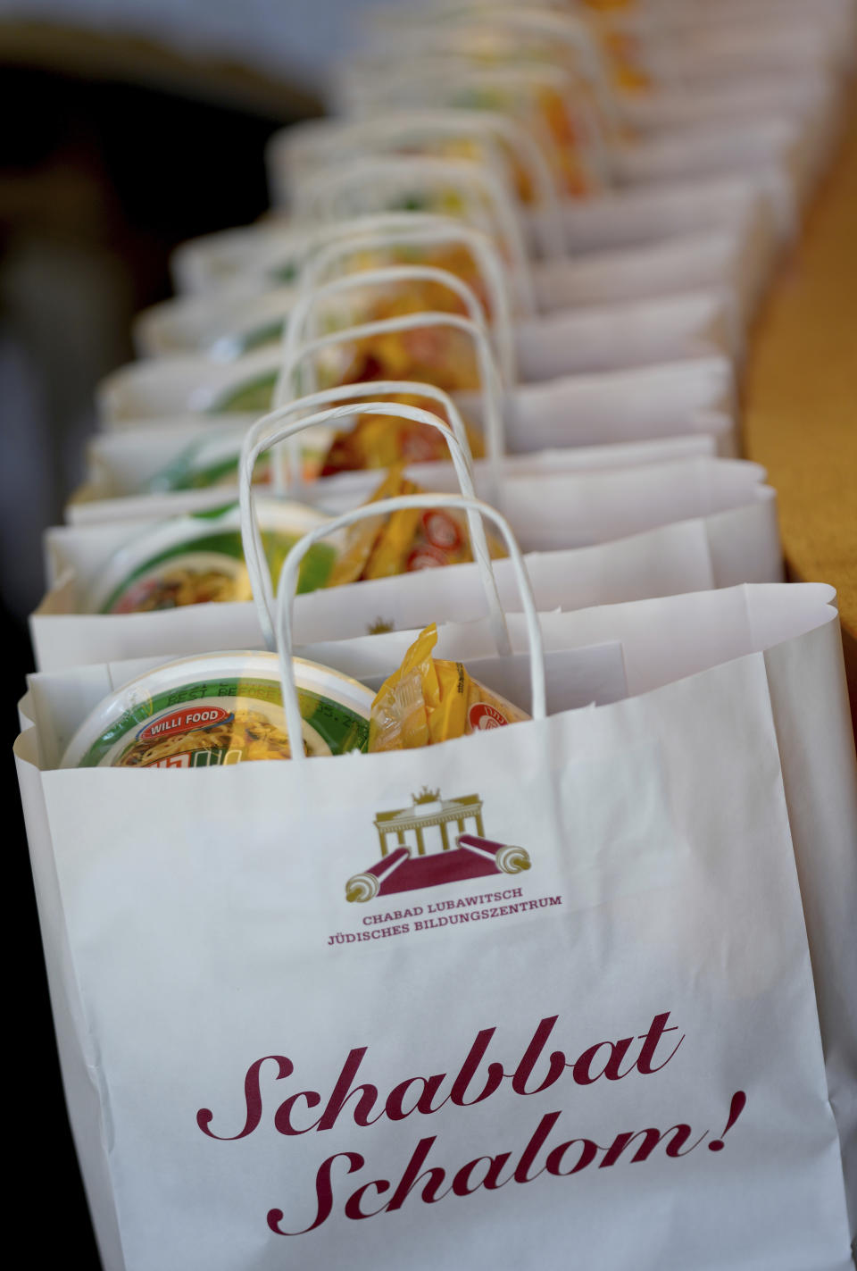 Welcome bags are ready for regfugees from the Ukraine at the Jewish community center Szloma-Albam-House in Berlin, Germany, Tuesday, March 1, 2022. As Russia's war in Ukraine drags into its second week, more than 1.5 million Ukrainians immigrants living in other European countries, are watching on in agony, horror and fear as their relatives and friends back home are looking for shelter in bunkers or are desperately trying to flee the country. (AP Photo/Michael Sohn)