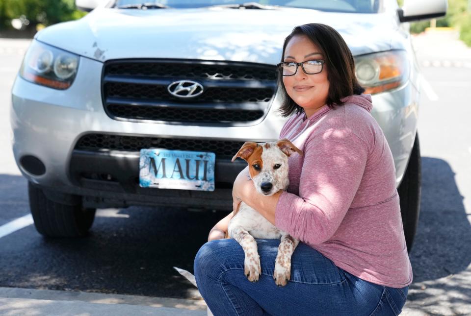 Maui native Brittany Lynn with her dog, Penny, on Aug. 15, 2023, now lives in Cottonwood, Ariz..