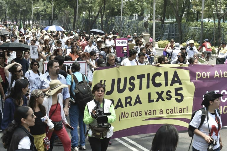 Photojournalists and activists of social organizations protest for the murder of their colleague Ruben Espinosa and four women in Mexico City on August 16, 2015