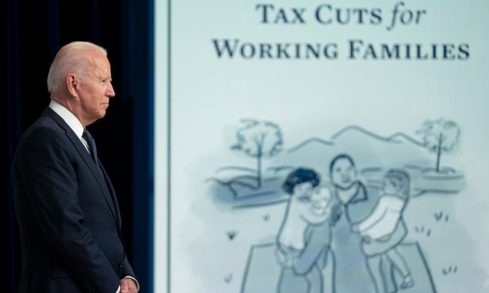 Joe Biden at an event marking the day families will get their first monthly child tax credit relief payments.