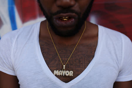 Anwar Thomas, 29, a manager for rap artists and musicians, poses for a portrait in the Brooklyn borough of New York, U.S., September 2, 2018. "Rap artists set all the trends right now for me personally," Thomas said. REUTERS/Caitlin Ochs