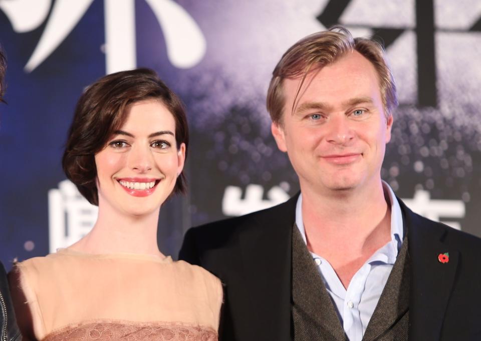 Anne Hathaway and director Christopher Nolan promote "Interstellar" in 2014.  (Photo: VCG via Getty Images)