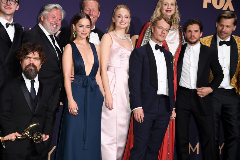 (l-R) Actors Isaac Hempstead Wright, Peter Dinklage, Conleth Hill, Emilia Clarke, Iain Glen, Sophie Turner, Alfie Allen, Gwendoline Christie, Kit Harington and Nicolaj Coster-Waldau pose with the Emmy for Outstanding Drama Series "Game Of Thrones" during the 71st Emmy Awards at the Microsoft Theatre in Los Angeles on September 22, 2019. (Photo by Robyn Beck / AFP)        (Photo credit should read ROBYN BECK/AFP via Getty Images)