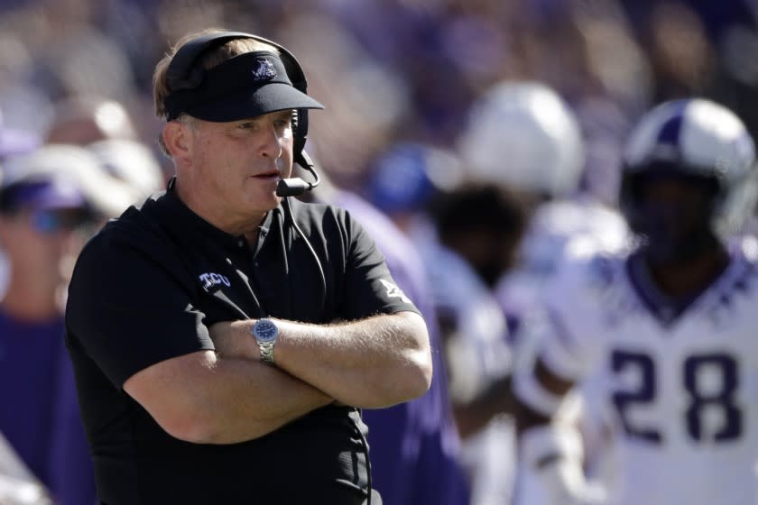 FILE - In this Oct. 19, 2019, file photo, TCU coach Gary Patterson watches during the first half of the team's NCAA college football game against Kansas State in Manhattan, Kan. TCU's chancellor said coach Gary Patterson apologized Monday, Aug. 3, 2020 for repeating a racial slur when telling a player to stop using the slur in team meetings. Linebacker Dylan Jordan accused Patterson on Twitter of using the slur during a confrontation at practice (AP Photo/Charlie Riedel, File)