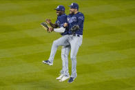 Tampa Bay Rays' Randy Arozarena, left, and teammate Kevin Kiermaier celebrates after a baseball game against the New York Mets Wednesday, Sept. 23, 2020, in New York. The Rays won 8-5. (AP Photo/Frank Franklin II)