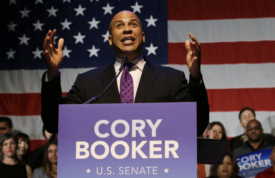 Newark Mayor Cory Booker talks to supporters during an election night victory party after winning a special election for the U.S. Senate, Wednesday, Oct. 16, 2013, in Newark, N.J. Booker and Republican Steve Lonegan faced off to fill the U.S. Senate seat left vacant by the death of Sen. Frank Lautenberg. (AP Photo/Julio Cortez)