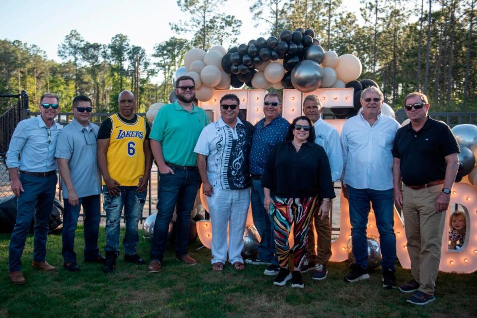 City leaders from Gautier and Ocean Springs, including Gautier Mayor Casey Vaughn and Ocean Springs Mayor Kenny Holloway pose for a photo before the inaugural show at The Sound Amphitheater in Gautier on Friday, April 12, 2024. Hannah Ruhoff/Sun Herald