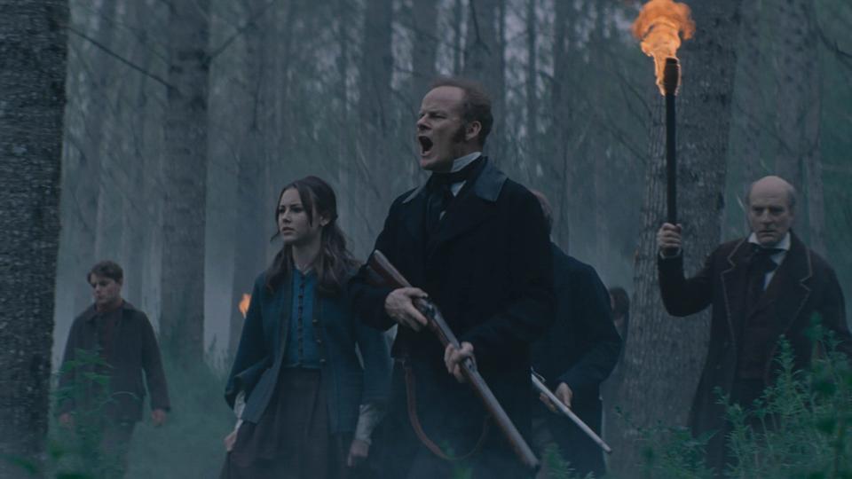 A British land baron (Alistair Petrie, center) searches for his missing son in the period horror drama "Eight for Silver."