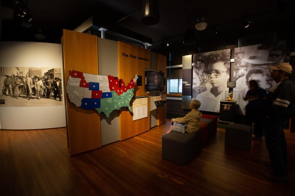 Visitors to the Brown v. Board of Education National Historic Park are educated about the history of the five lawsuits that brought about desegregation in schools during the 1950s through interactive galleries.