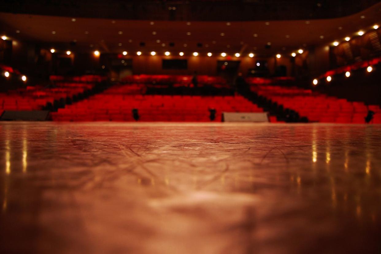 low-angle view from the theater stage to the seats