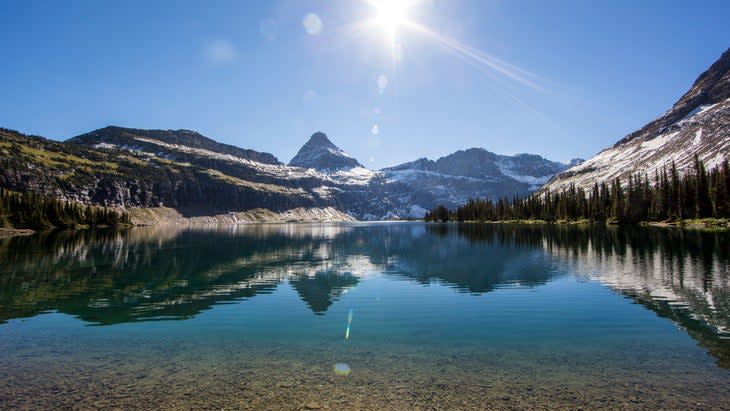 <span class="article__caption">Find the not so Hidden Lake, a storied destination in Glacier National Park, Montana.</span> (Photo: Jordan Siemens/Getty)