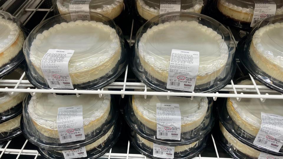 Display of cheesecakes in plastic cases at a Costco