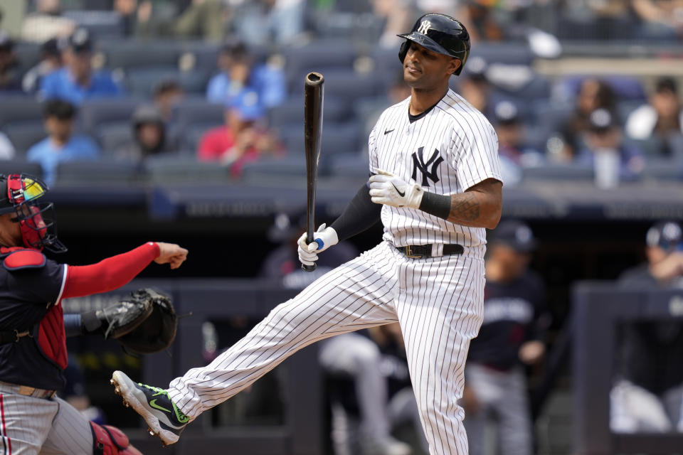 FILE - New York Yankees' Aaron Hicks reacts after striking out against Minnesota Twins starting pitcher Pablo Lopez in the second inning of a baseball game, Sunday, April 16, 2023, in New York. The New York Yankees cut struggling outfielder Aaron Hicks before Saturday's game against the Cincinnati Reds. Hicks was designated for assignment to make room for outfielder Greg Allen, who was acquired in a trade with Boston on Friday. (AP Photo/John Minchillo, File)