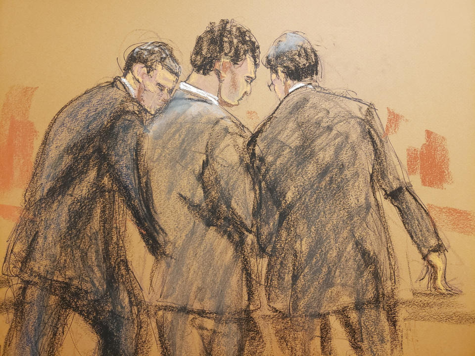 FTX founder Sam Bankman-Fried stands with his lawyers in this courtroom sketch after the verdict was read in the fraud trial related to the collapse of the bankrupt cryptocurrency exchange in federal court in New York City, U.S., on November 2, 2023.  REUTERS/Jane Rosenberg TPX Images