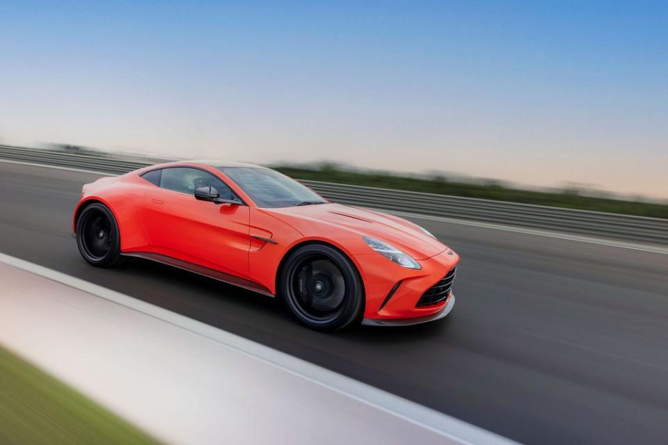 a red sports car on a road