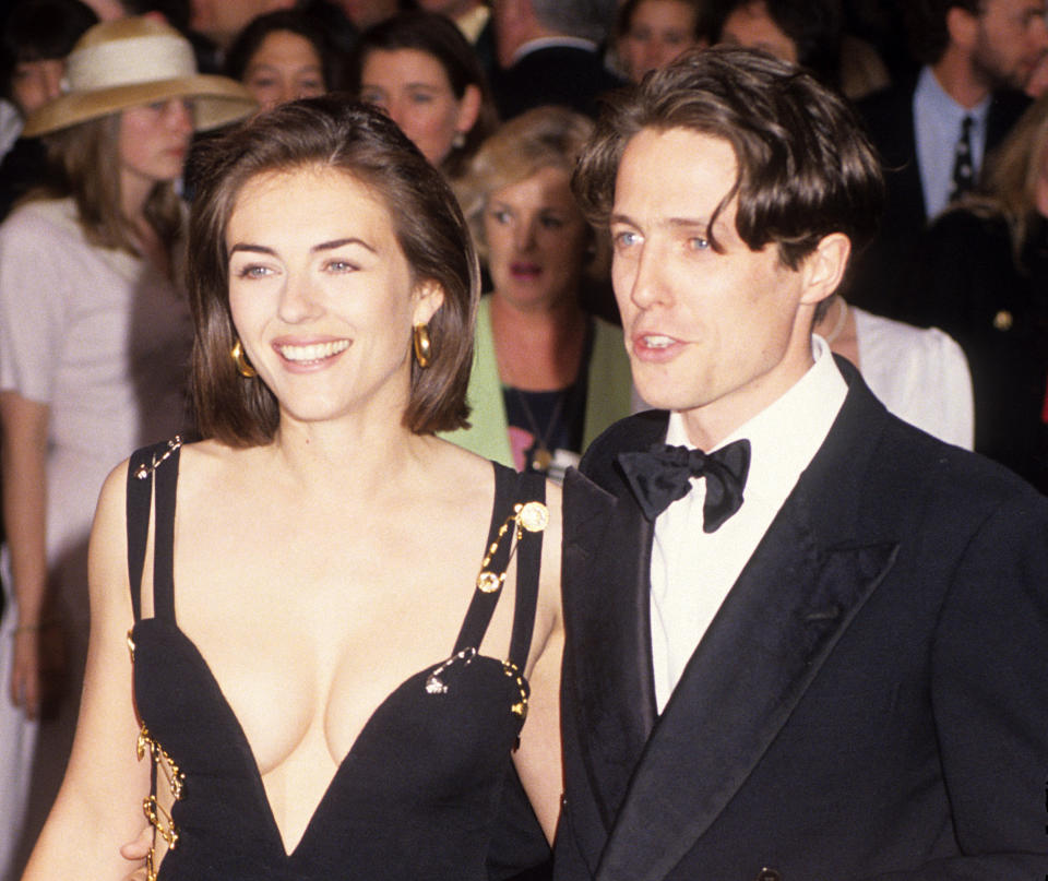 Elizabeth Hurley and Hugh Grant (Photo by Tom Wargacki/WireImage)