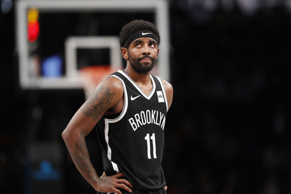 Brooklyn Nets guard Kyrie Irving (11) reacts during the first half of the team's NBA basketball game against the Indiana Pacers, Wednesday, Oct. 30, 2019, in New York. The Pacers won 118-108. (AP Photo/Kathy Willens)