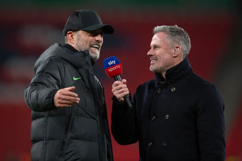 Liverpool manager Jürgen Klopp is interviewed by Sky Sports commentator Jamie Carragher during the Carabao Cup Final match between Chelsea and Liverpool at Wembley Stadium on February 25, 2024 in London, England.