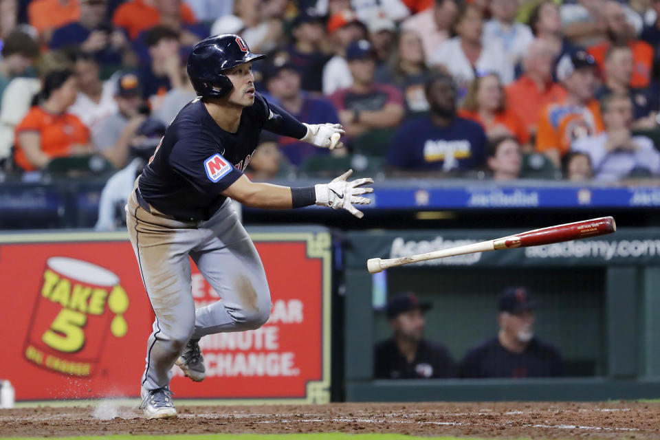 Cleveland Guardians' Steven Kwan tosses his bat as he watches his hit for a triple against the Houston Astros during the sixth inning of a baseball game Tuesday, April 30, 2024, in Houston. (AP Photo/Michael Wyke)