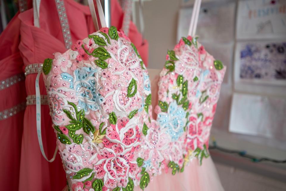 Prom gown donations hang on racks in a classroom at Bensalem High School on Tuesday, March 14, 2023. The school has put together a closet of prom gown donations for students to choose from for their upcoming senior prom on April 21.