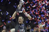 FILE - New England Patriots' Tom Brady raises the Vince Lombardi Trophy after defeating the Atlanta Falcons in overtime at the NFL Super Bowl 51 football game Sunday, Feb. 5, 2017, in Houston. Brady, the seven-time Super Bowl winner with New England and Tampa Bay, announced his retirement from the NFL on Wednesday, Feb. 1, 2023 exactly one year after first saying his playing days were over. He leaves the NFL with more wins, yards passing and touchdowns than any other quarterback. (AP Photo/Darron Cummings, File)