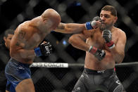 Nick Diaz, right, fights Robbie Lawler during a middleweight mixed martial arts bout at UFC 266, Saturday, Sept. 25, 2021, in Las Vegas. (AP Photo/John Locher)