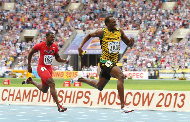 Usain Bolt (right) outpaces Justin Gatlin during the 4x100 metres relay final at the 2013 IAAF World Championships in Moscow on August 18, 2013