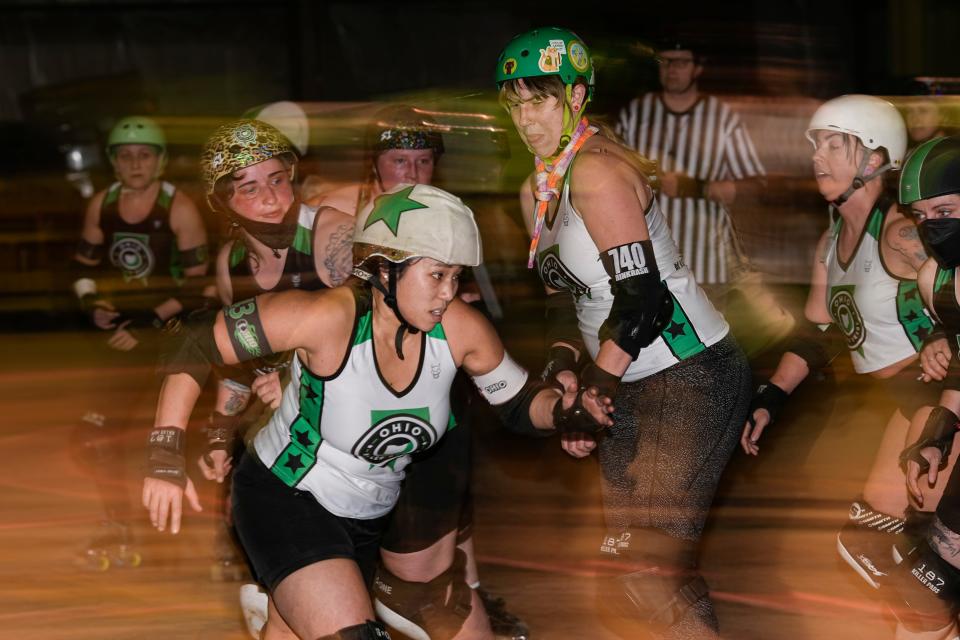 Jammer “Brutachris” Chris Nguyen skates around the outside of the track during an Ohio Roller Derby scrimmage at their practice warehouse. The league, which was founded in 2005, will hold their next games on March 30 in the Lausche Building at the Ohio Expo Center.