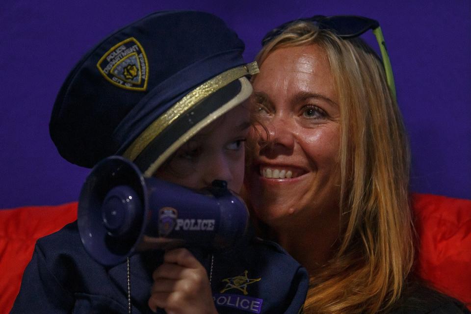 Caedyn Jynella, 4, sees his new law enforcement-themed room with his mother Jessie Fairbanks.