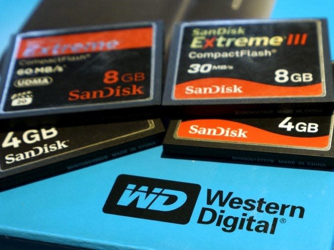 A variety of SanDisk memory cards are seen with a Western Digital hard drive box in Golden, Colorado in this photo illustration October 21, 2015. REUTERS/Rick Wilking