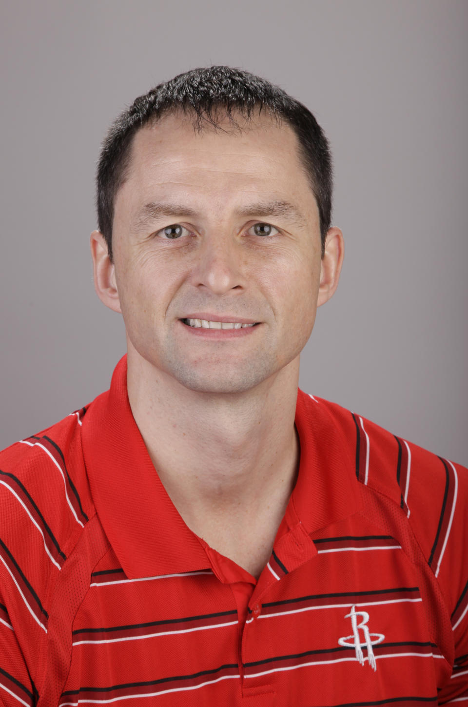 FILE - In this Dec. 15, 2011, file photo, Houston Rockets director of global scouting Arturas Karnisovas poses during the NBA basketball team's media day in Houston. The Bulls hired Denver Nuggets general manager Karnisovas to run their basketball operation, a person familiar with the situation said Thursday night, April 9, 2020. The person, who confirmed reports by several outlets, spoke on the condition of anonymity because the move has not been announced. Longtime executive John Paxson was expected to move into an advisory role. (AP Photo/David J. Phillip, File)