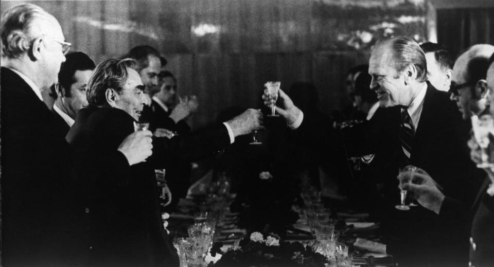 Former U.S. President Gerald Ford and Soviet leader Leonid Brezhnev toast following nuclear nonproliferation talks in 1974. <a href="https://www.gettyimages.com/detail/news-photo/american-statesman-gerald-ford-the-38th-president-of-the-news-photo/3277304?adppopup=true" rel="nofollow noopener" target="_blank" data-ylk="slk:Keystone/CNP/Getty Images;elm:context_link;itc:0;sec:content-canvas" class="link ">Keystone/CNP/Getty Images</a>