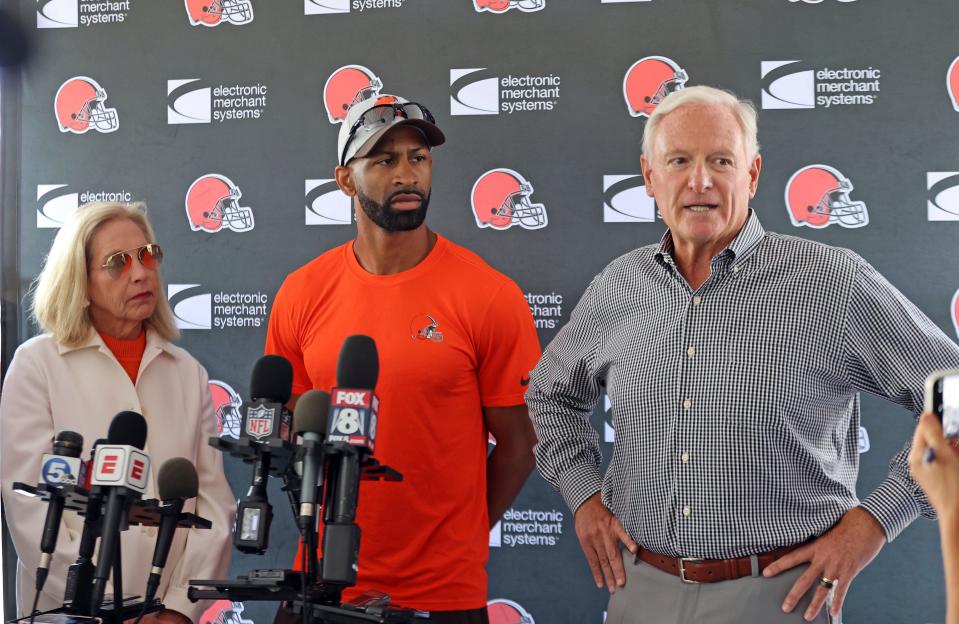Cleveland Browns co-owner Jimmy Haslam, right, speaks to the media alongside the team's general manager Andrew Berry and Dee Haslam, who is also a co-owner.