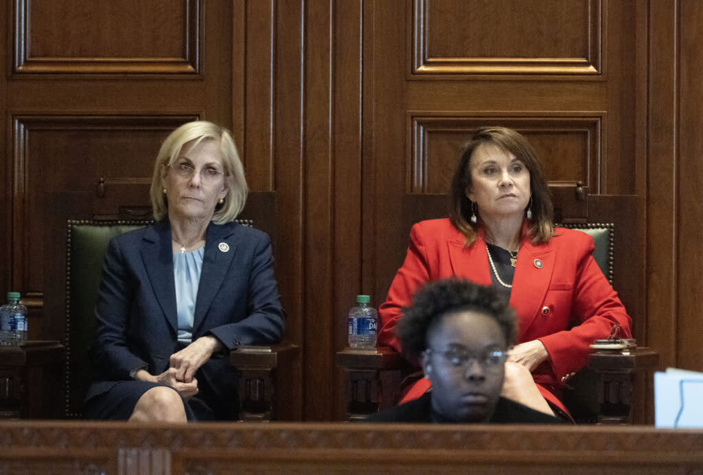 Louisiana Secretary of State Nancy Landry, left, sits with Louisiana Attorney General Liz Murrill as Gov. Jeff Landry speaks on opening day of a legislative special session focusing on crime, Monday, February 19, 2024, at the Louisiana State Capitol in Baton Rouge