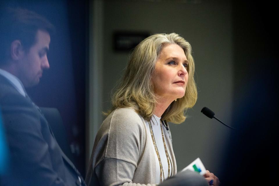 Commissioner Gretchen Cosby asks a question during the board's meeting Tuesday, March 14, 2023, in West Olive. 