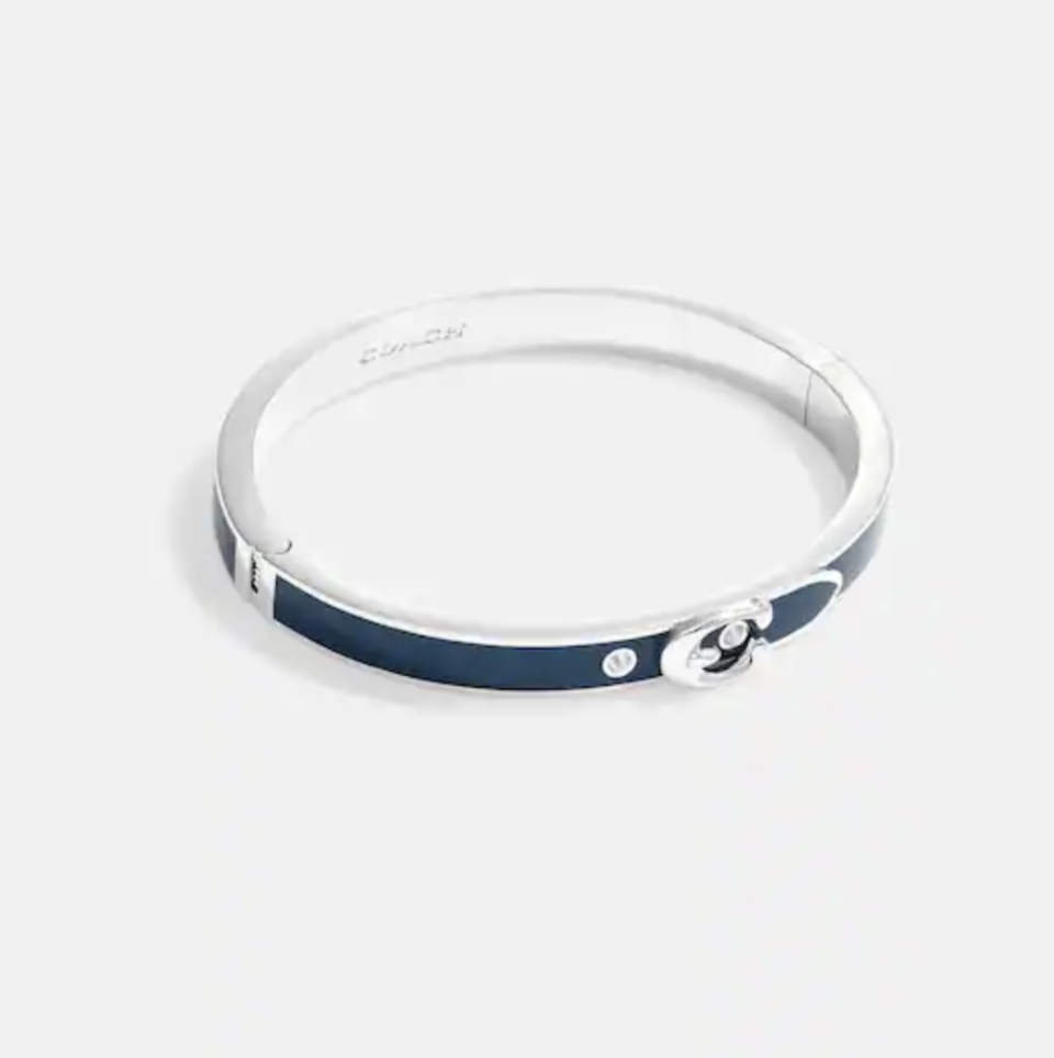 Signature Thin Buckle Bangle (Photo via Coach)