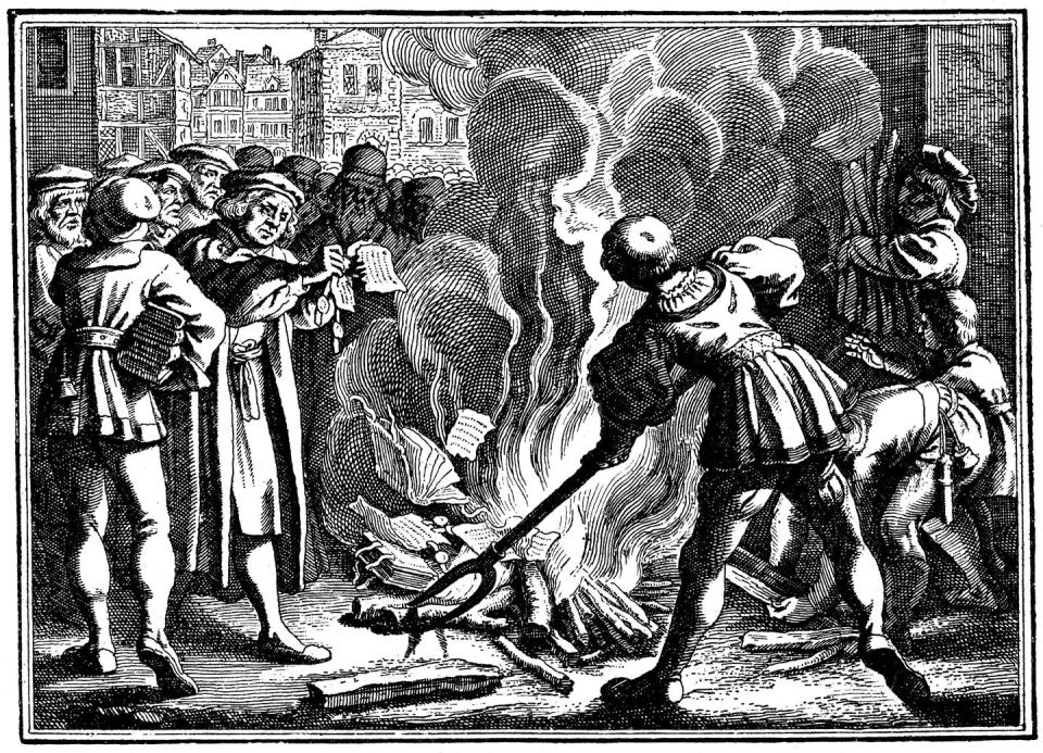 A crowd stands around a flame as a man burns papers in this black and white drawing.