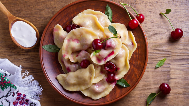 Cherry-filled pierogi on plate
