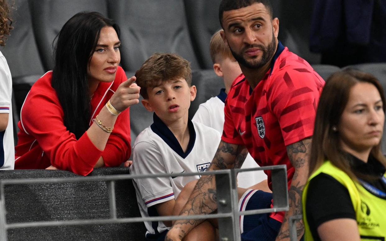 Kyle Walker with his wife Annie Kilner and their children at the Denmark vs England match