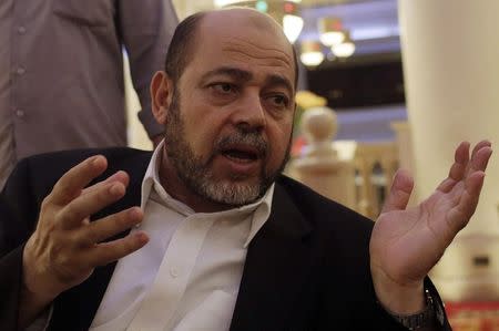 Deputy chairman of Hamas' political bureau Moussa Abu Marzouk talks during an interview with Reuters in Cairo, August 9, 2014. REUTERS/Asmaa Waguih