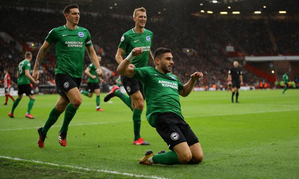 Neal Maupay celebrates scoring the equaliser for Brighton.